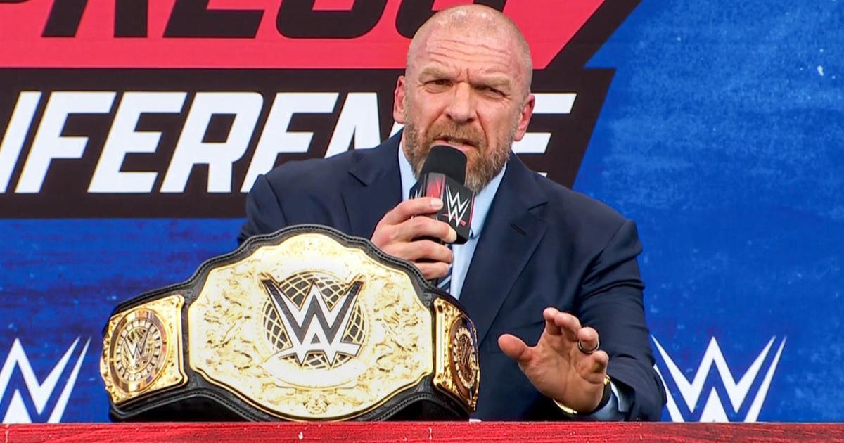 Triple H speaking during a WWE Press Conference.