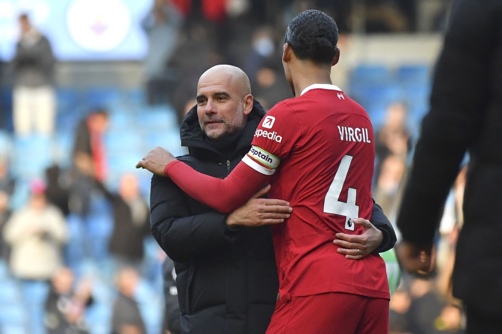 Manchester City boss Pep Guardiola (left)