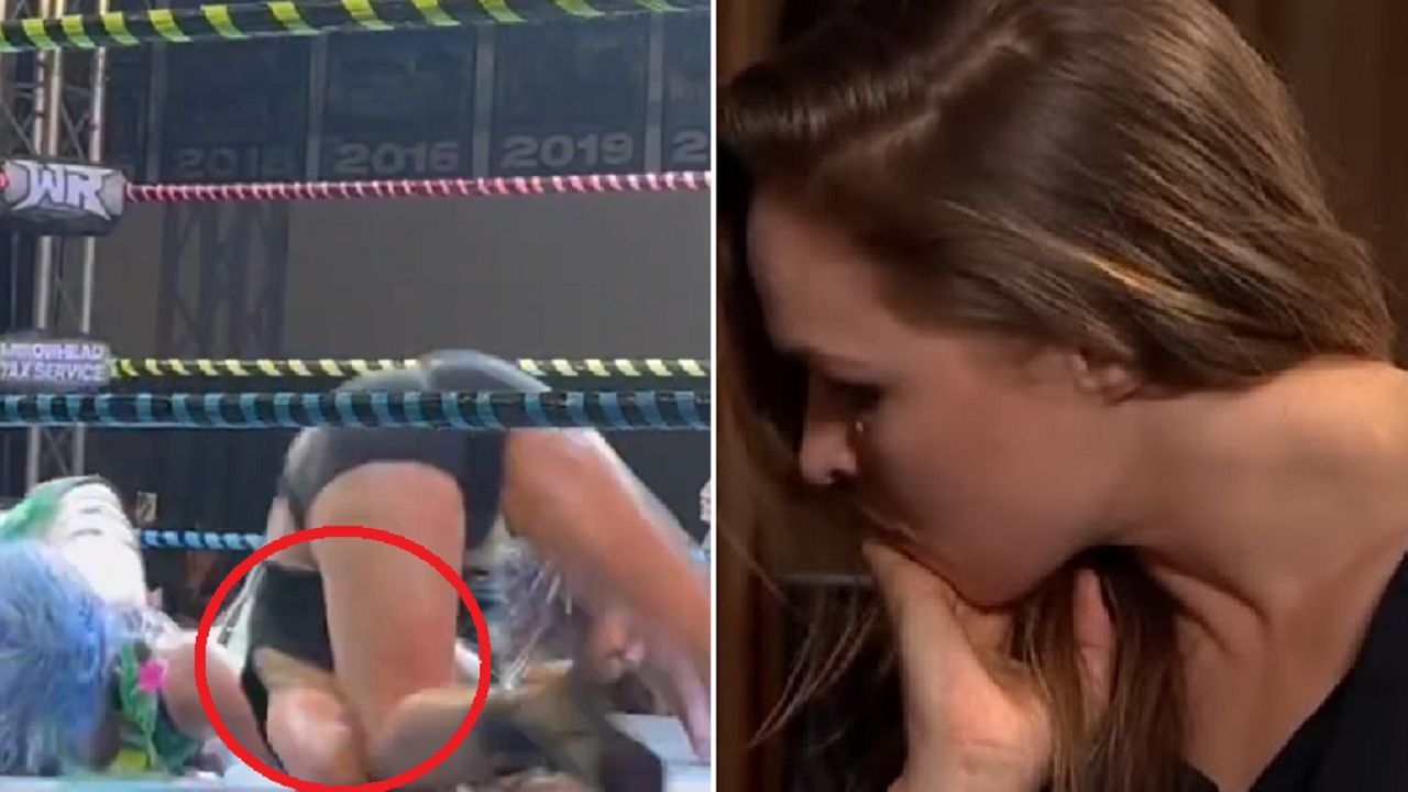 Rousey can be seen landing on her neck