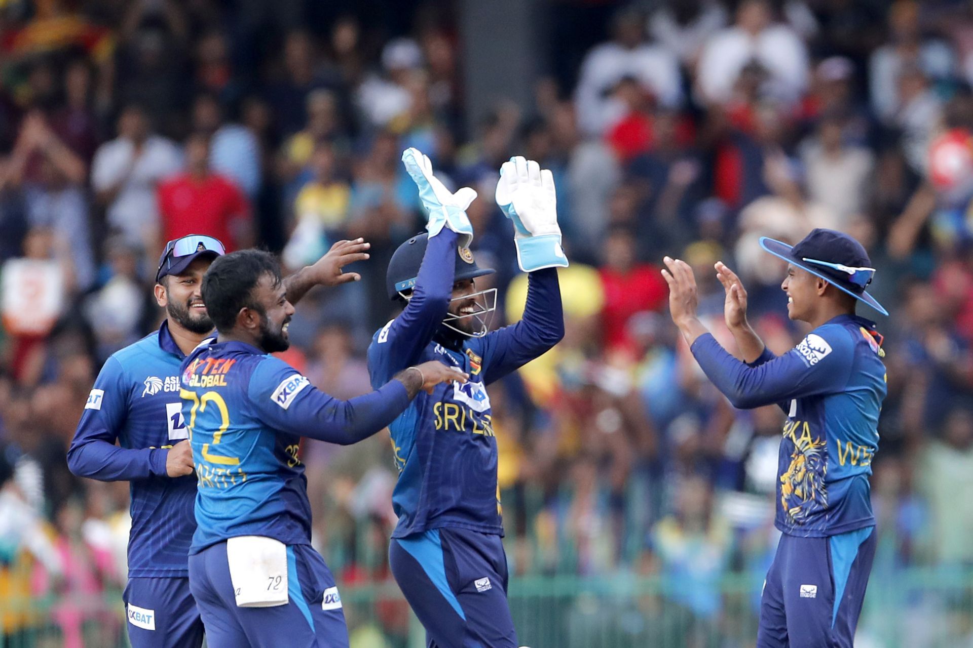 Dunith Wellalage takes a catch, Sri Lanka v India - Asia Cup