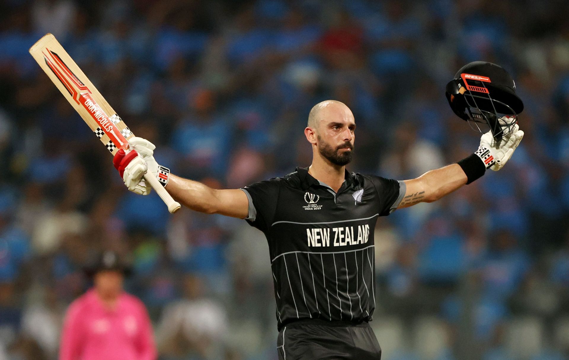 Daryl Mitchell silencing the Mumbai crowd with his remarkable century [Getty Images]