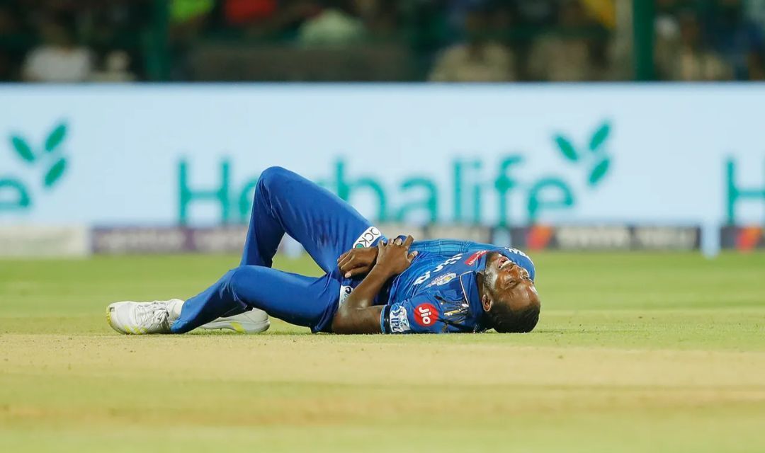 Jofra Archer laying down in the IPL 2023 match between MI and RCB [Getty Images]