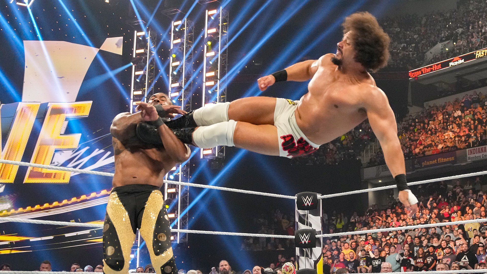 Carlito hitting a dropkick.