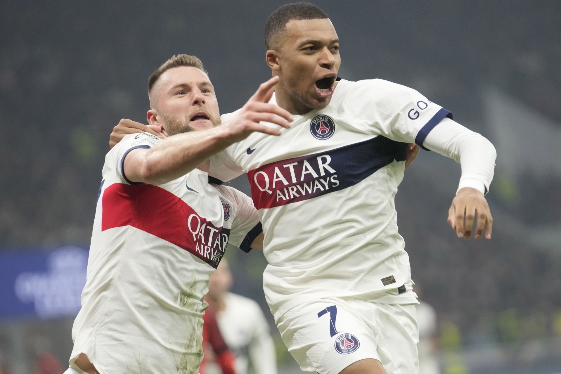 PSG striker Kylian Mbappe (right)