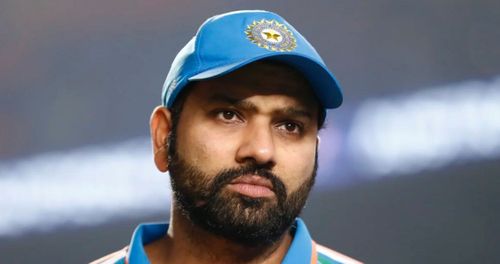 A glum Rohit Sharma looks on during the presentation ceremony.