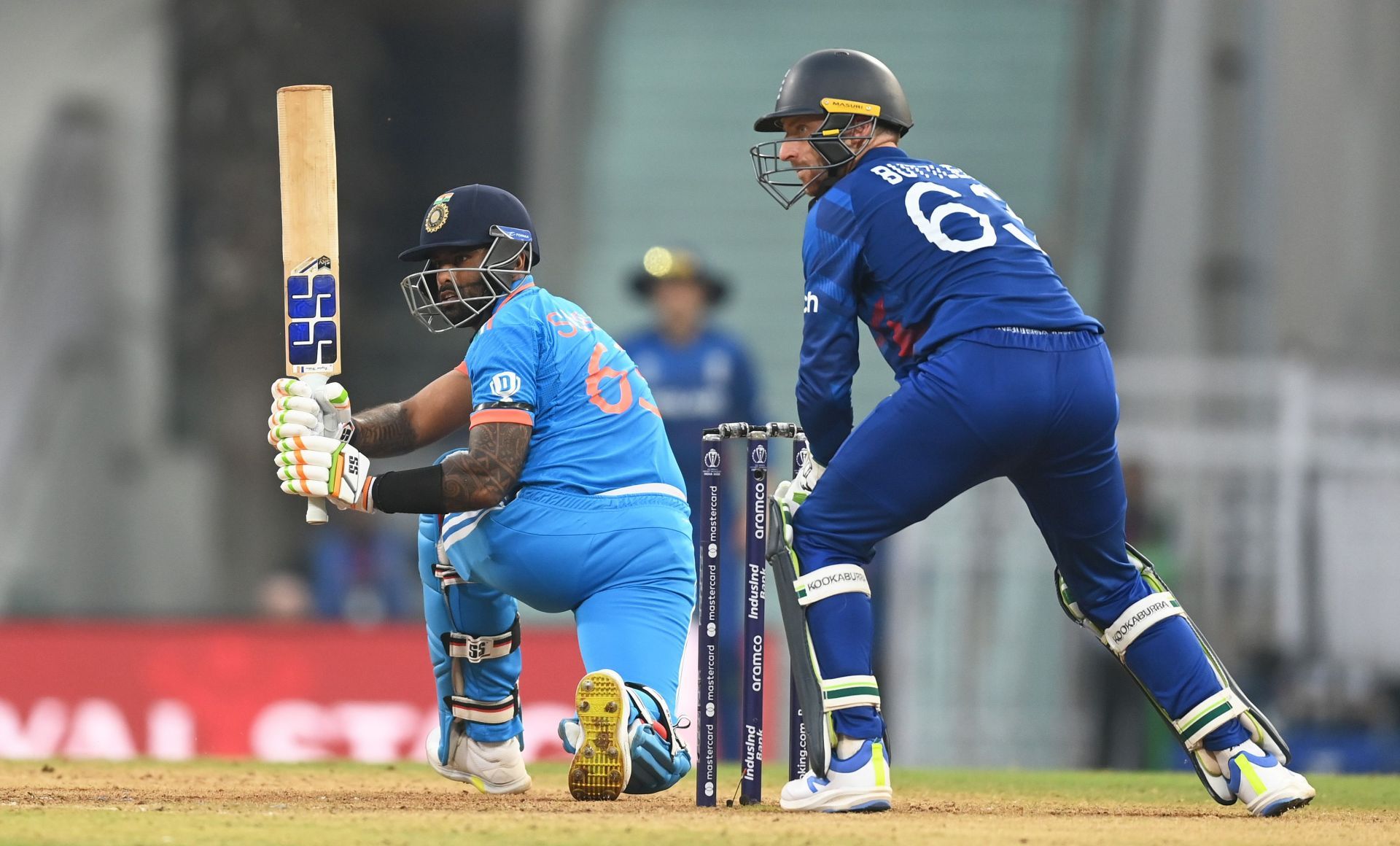 Suryakumar Yadav sweeping during the India v England - ICC World Cup 2023