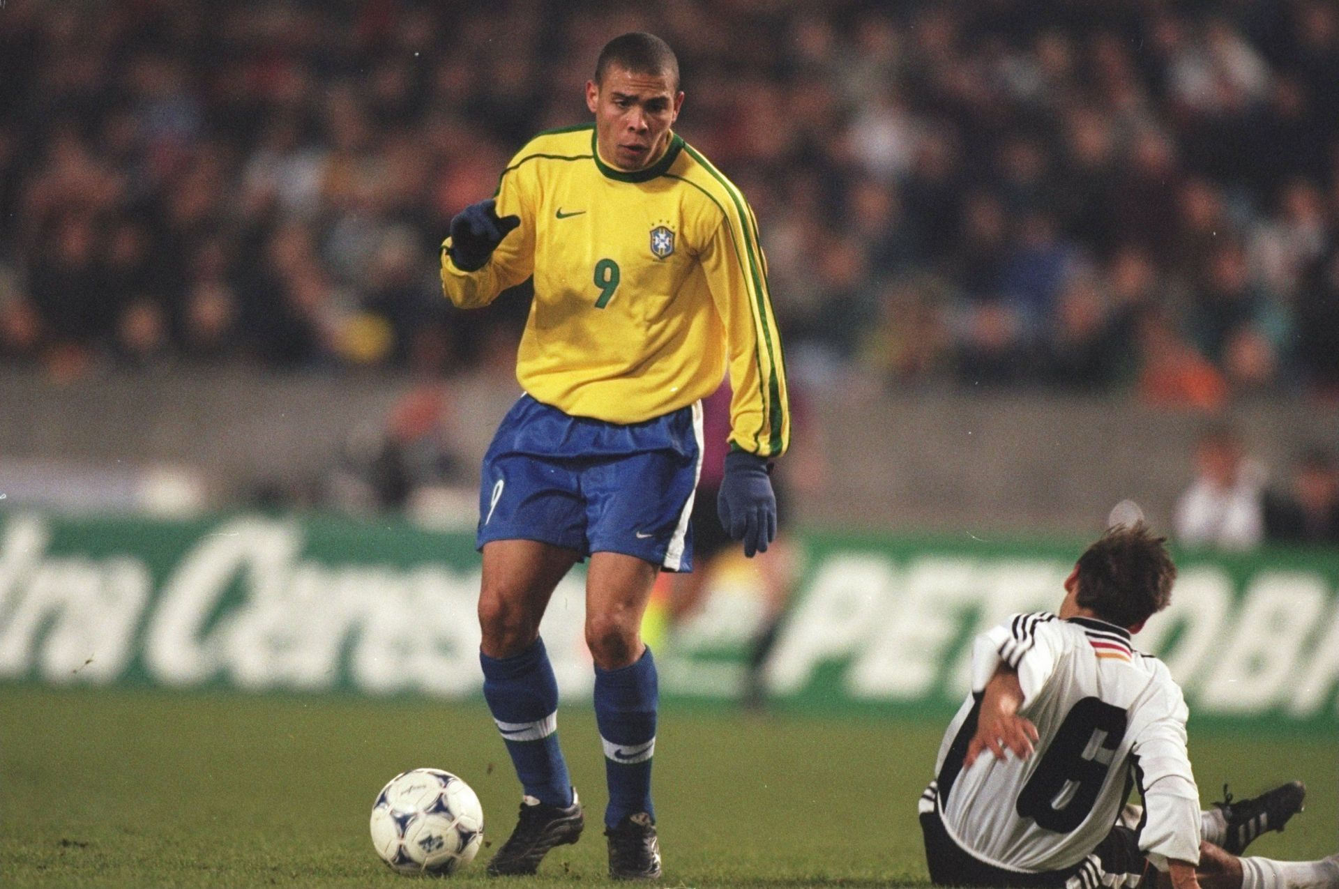 Ronaldo of Brazil and Olaf Thon of Germany
