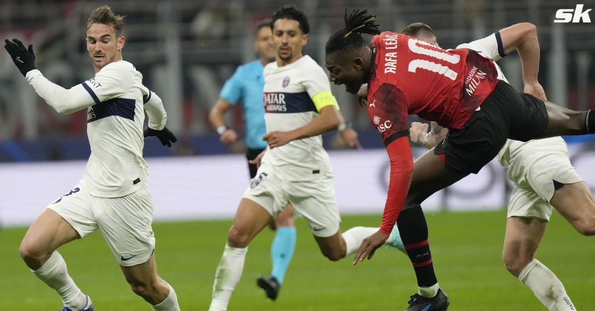 AC Milan and PSG players in action during their UEFA Champions League Group F fixture.