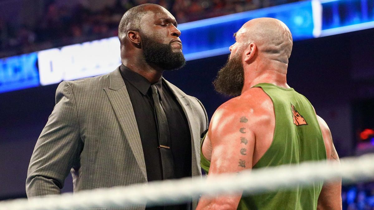 Omos (left) and Braun Strowman (right)