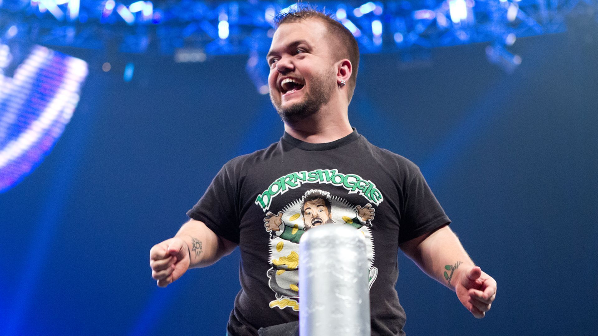 Hornswoggle poses in the ring for WWE fans