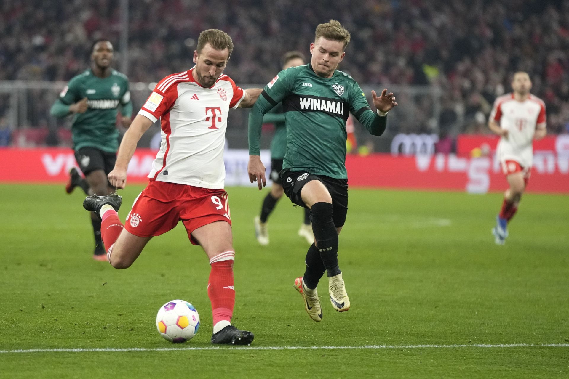 Harry Kane (left) moved to the Allianz Arena this summer.