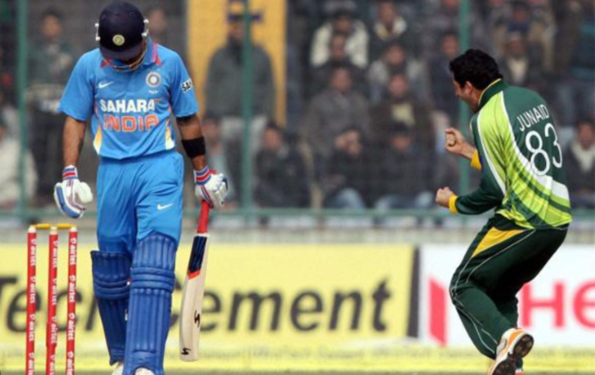 Junaid Khan rejoices dismissing Virat Kohli in the 2012-13 ODI series