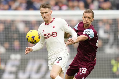 Manchester United midfielder Scott McTominay (left)