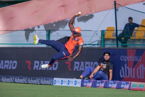 A flying Rovman Powell plucks the ball out of thin air before parrying it back in Delhi Bulls' tournament opener (Picture Credits: Abu Dhabi T10).