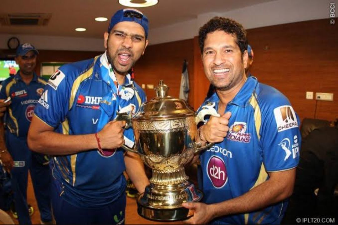Rohit Sharma and Sachin Tendulkar posing with the 2013 IPL trophy [Getty Images]
