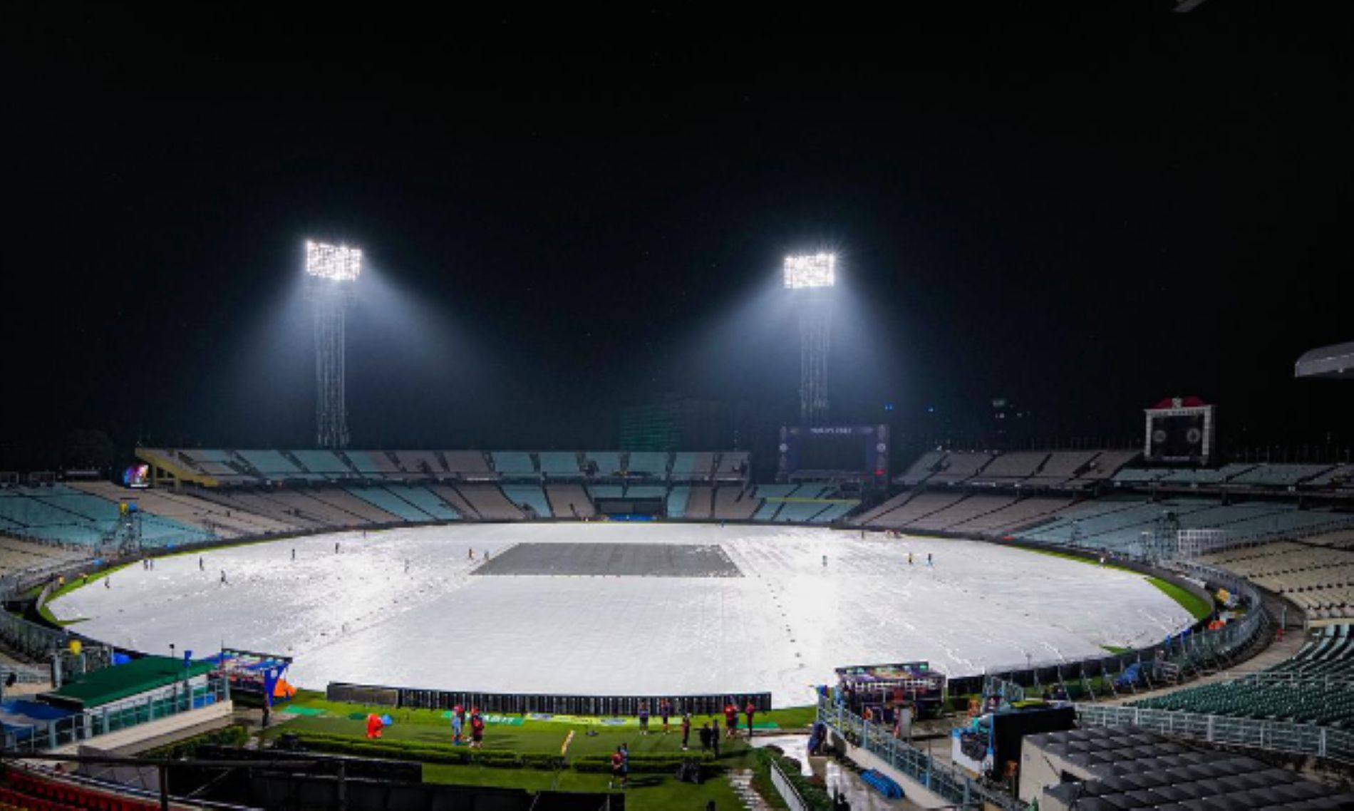 The Eden Gardens is fully covered during rain.