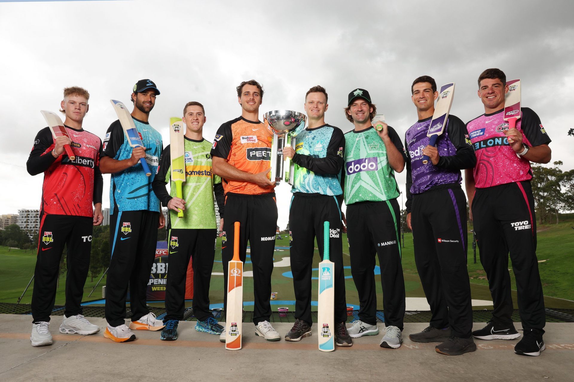 BBL captains posing with the BBL trophy