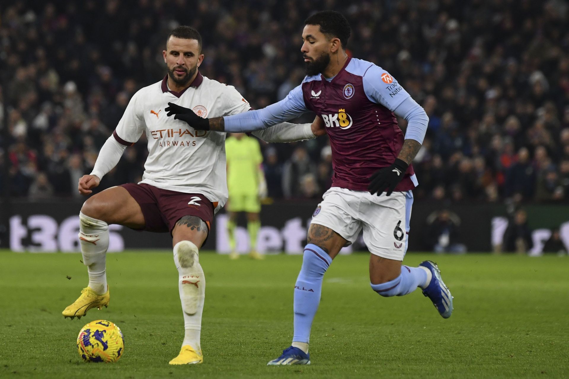 Douglas Luiz (right) is wanted at the Emirates.