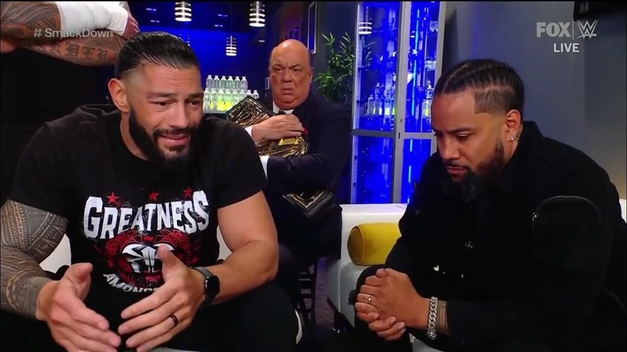 Roman Reigns and Jimmy Uso during a backstage segment on WWE SmackDown.