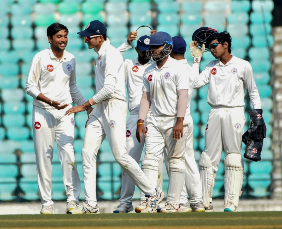 Siddharth Desai celebrating with his Gujarat teammates