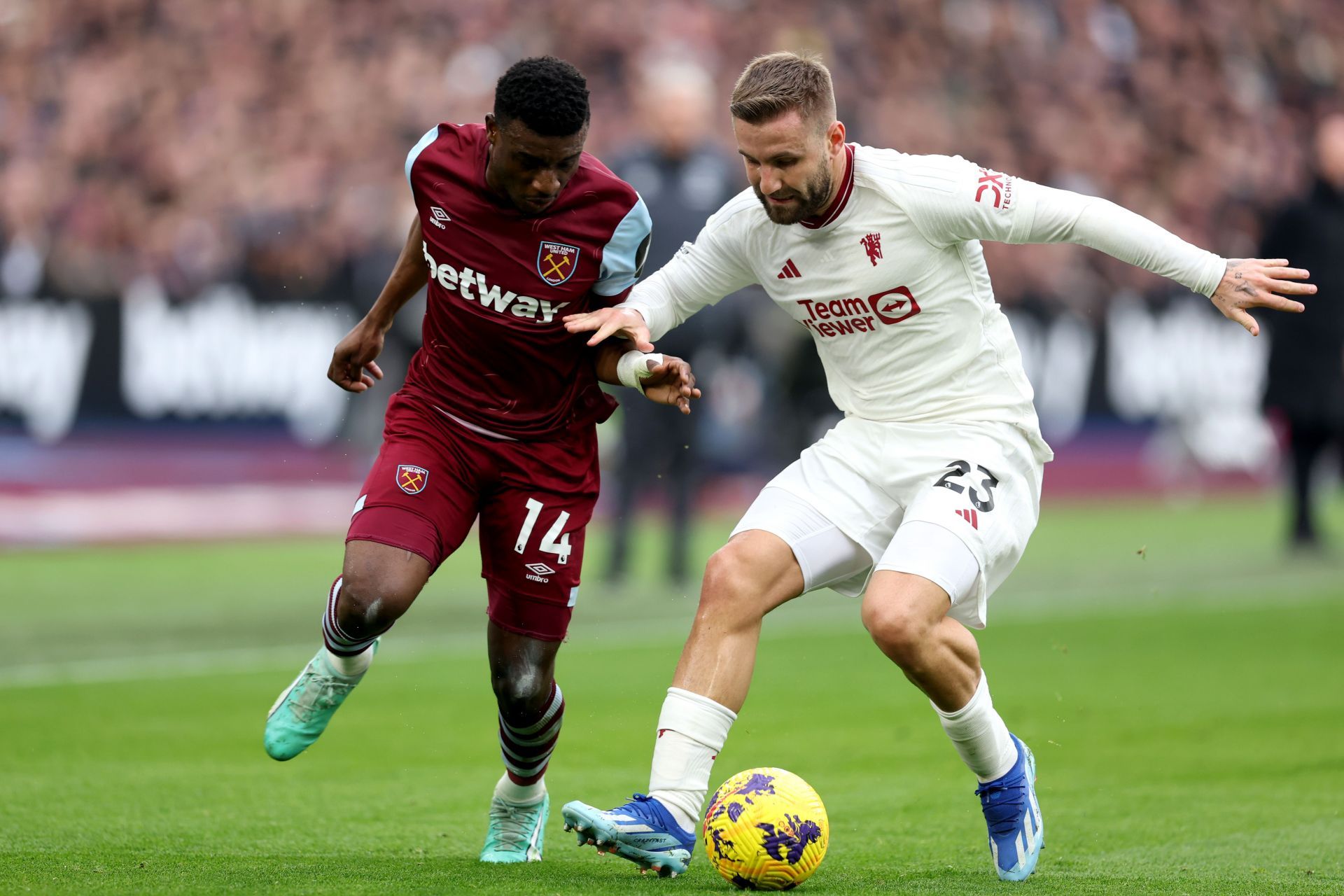 Luke Shaw (right) is wanted at Stamford Bridge.