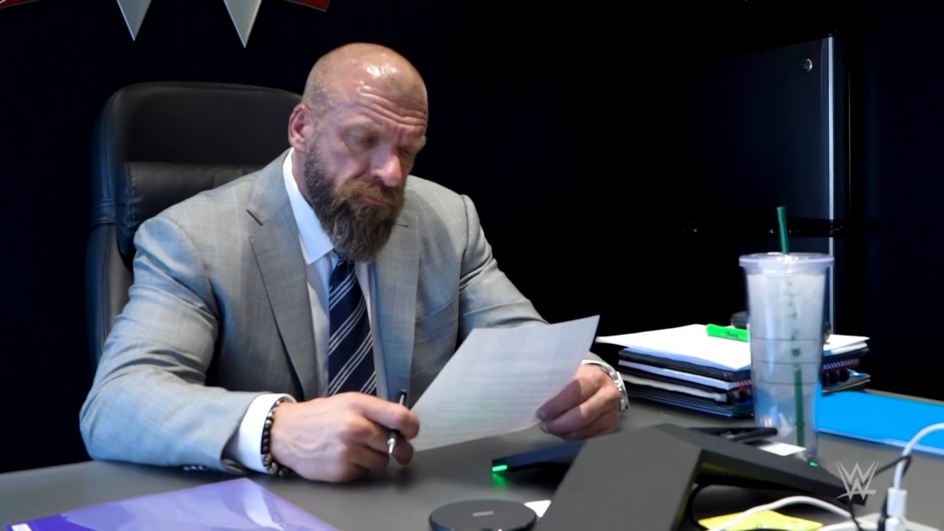 WWE legend Triple H in his office (from WWE