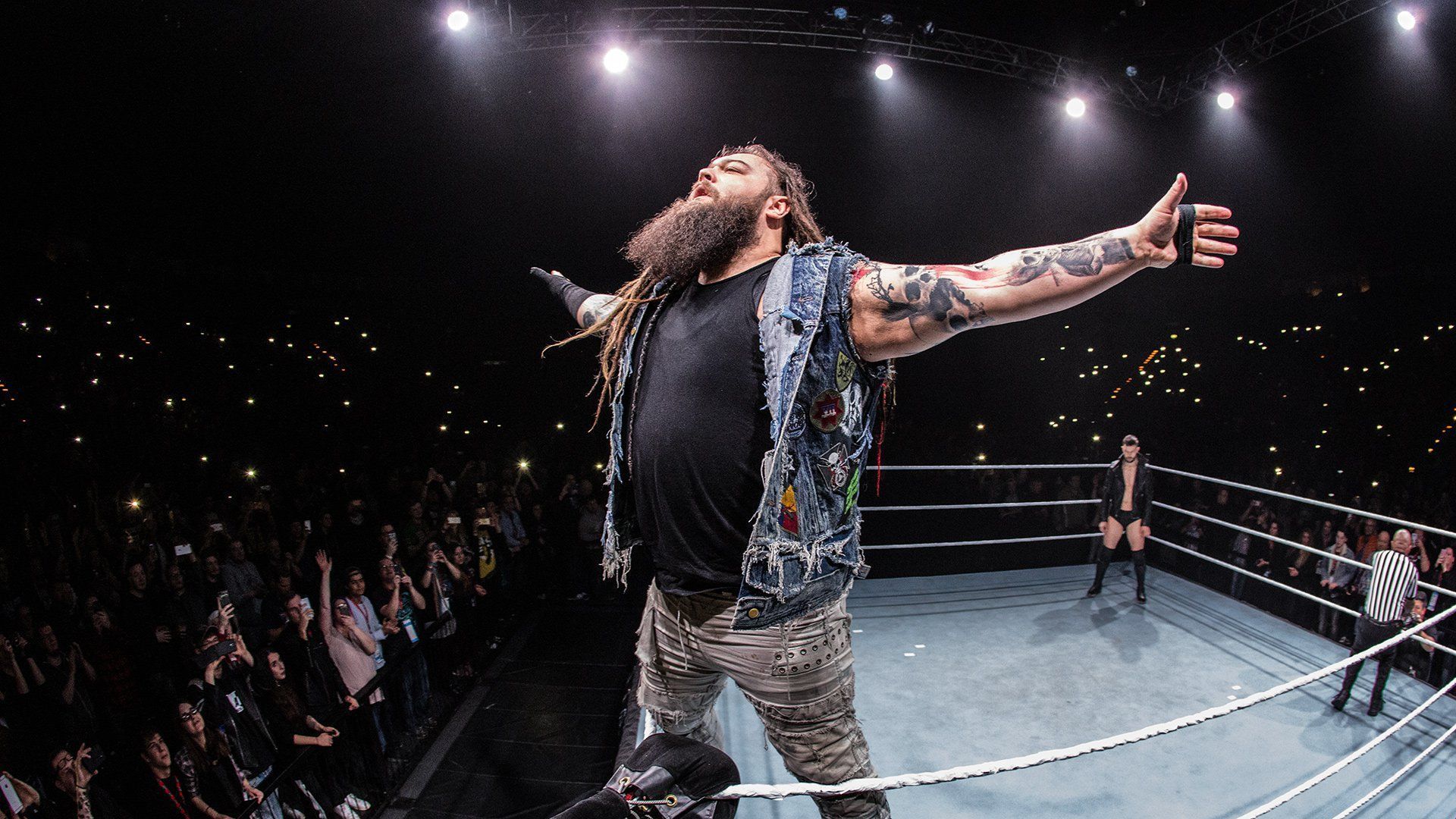 Bray Wyatt poses in the WWE ring for his fans