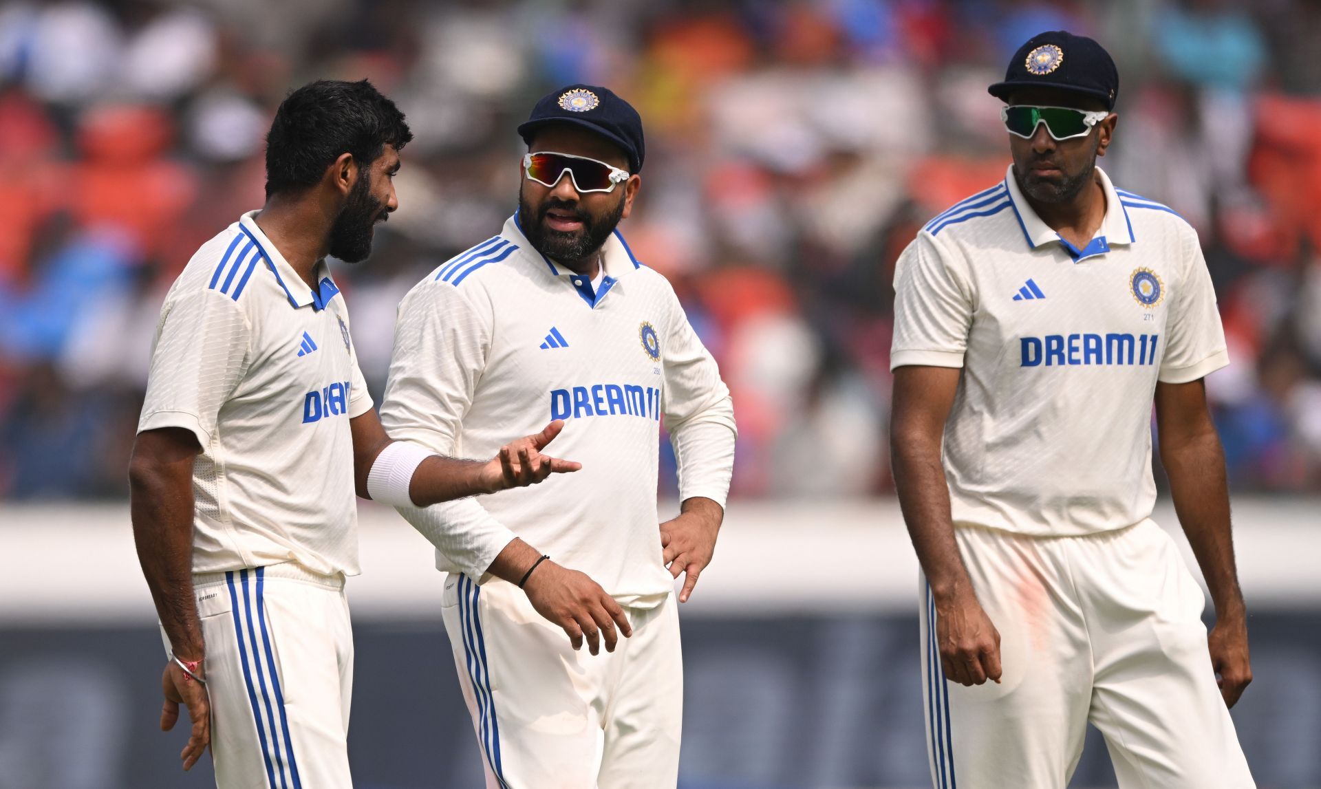 Jasprit Bumrah chats with his teammates