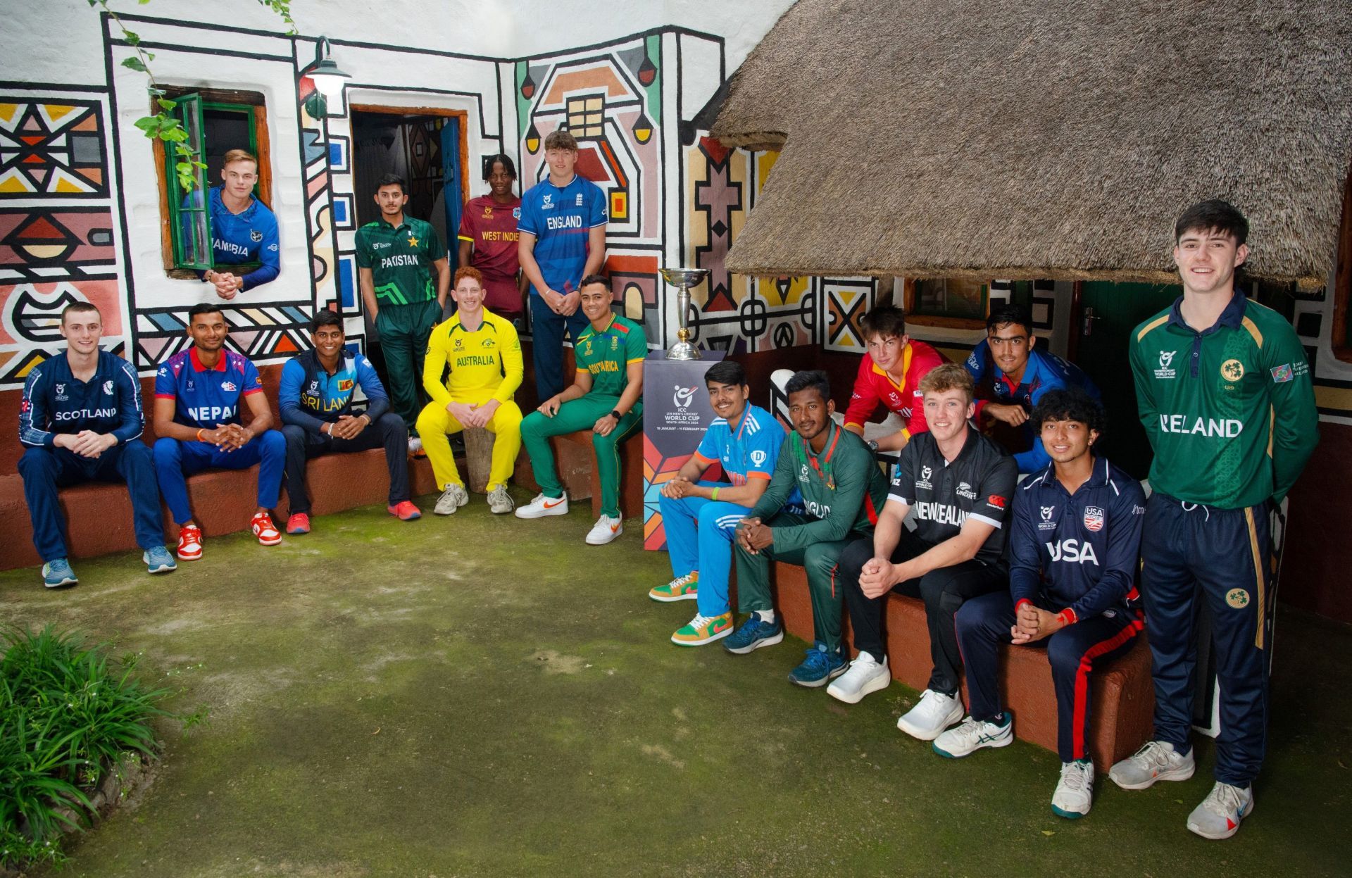 Captains of the 16 participating teams strike a pose with the U19 World Cup Trophy (Credits: ICC on X)