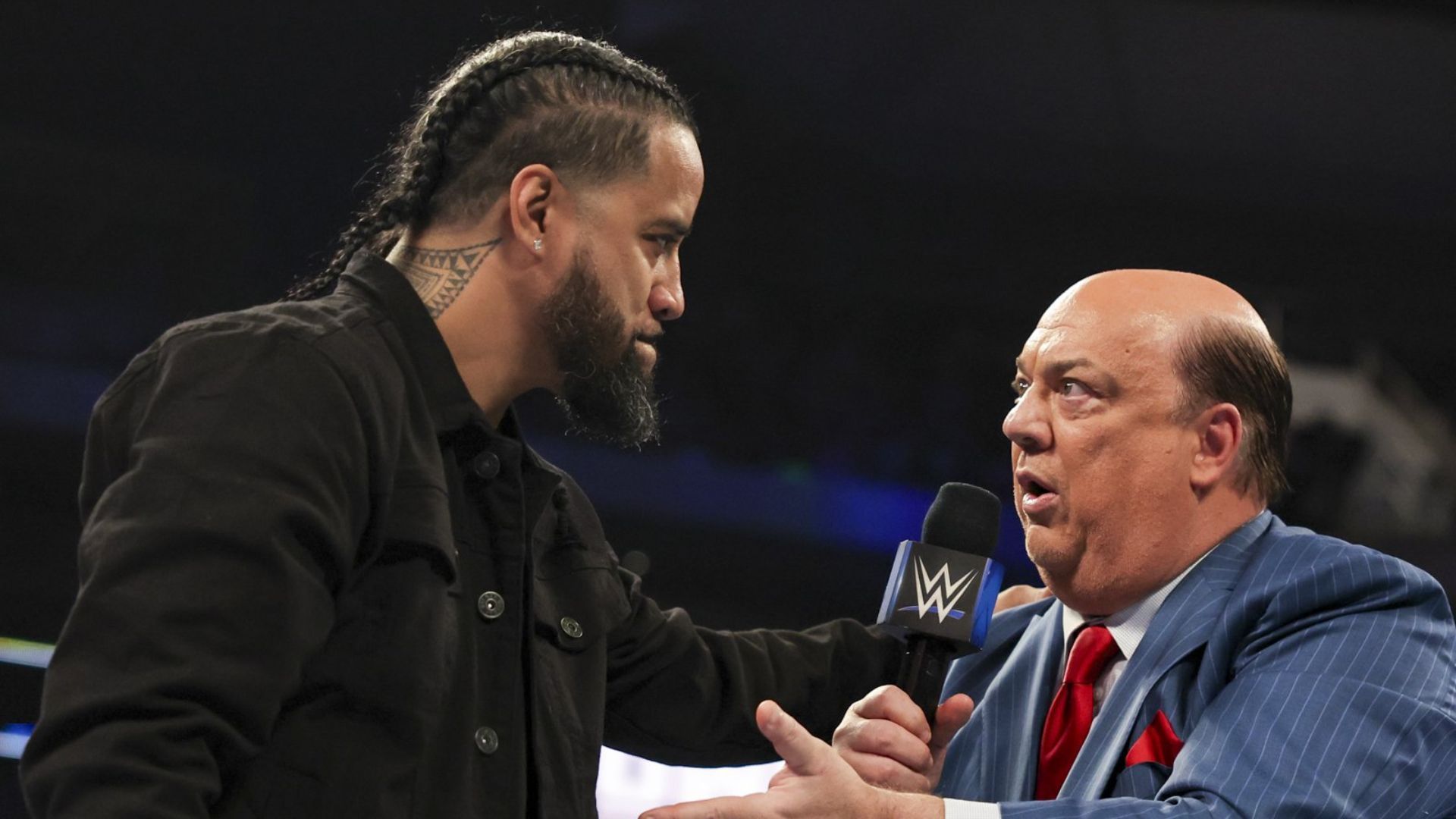 Jimmy Uso and Paul Heyman