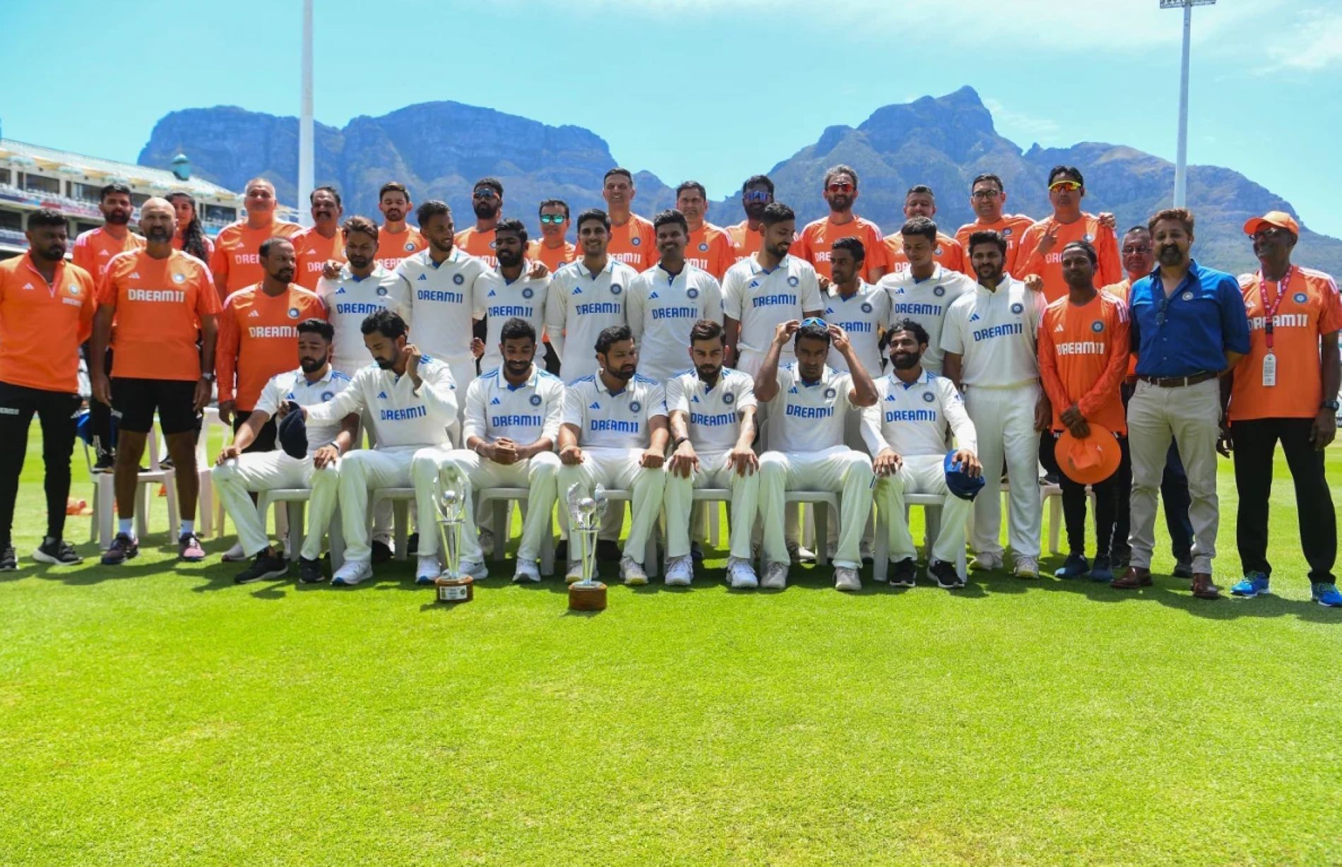 The Indian players pose after pulling off sensational win at Cape Town