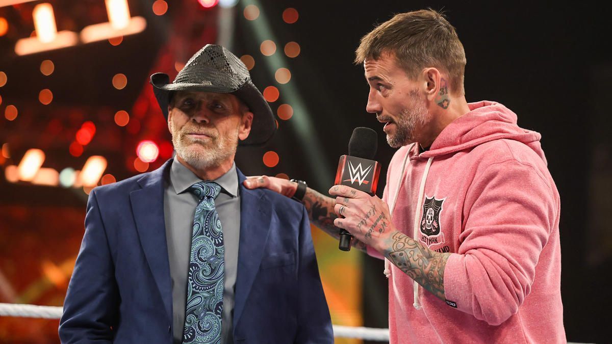 Punk with another undersized legend, Shawn Michaels.