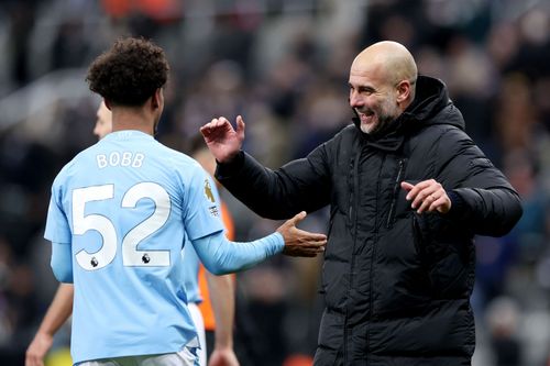 Manchester City boss Pep Guardiola (right)