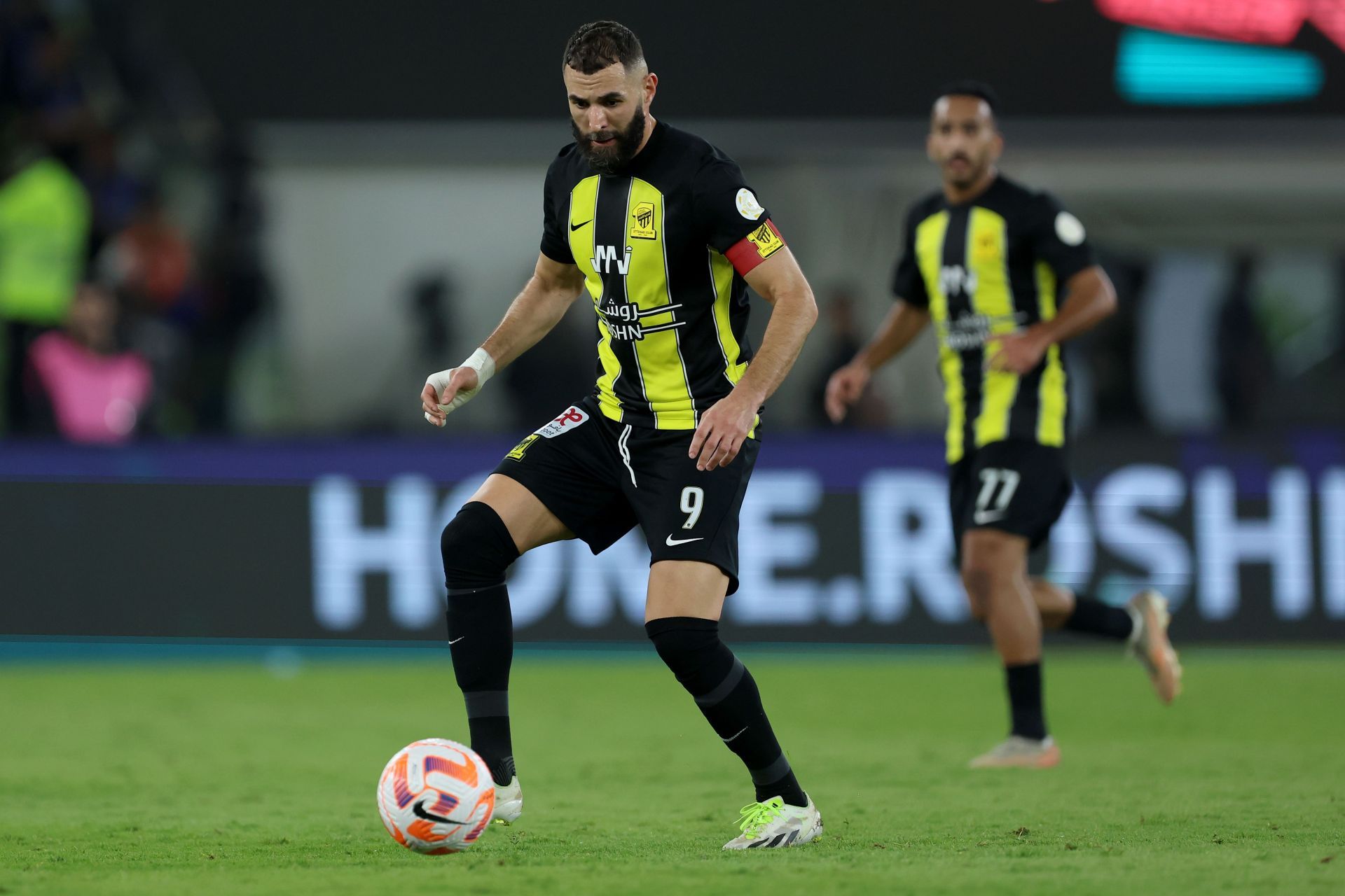 Karim Benzema (left) is eyeing a return to the Santiago Bernabeu