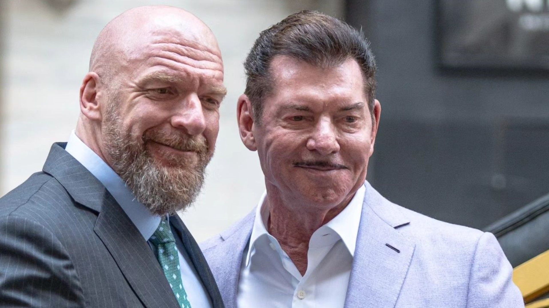 Vince McMahon and Triple H pose together at the NY Stock Exchange