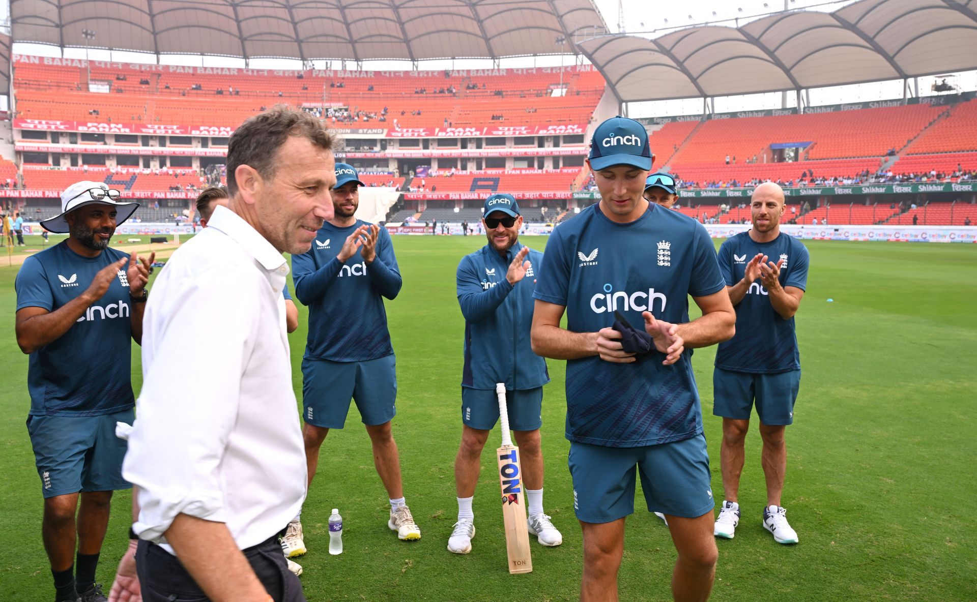 Tom Hatley receives his Test cap from former England captain Michael Atherton
