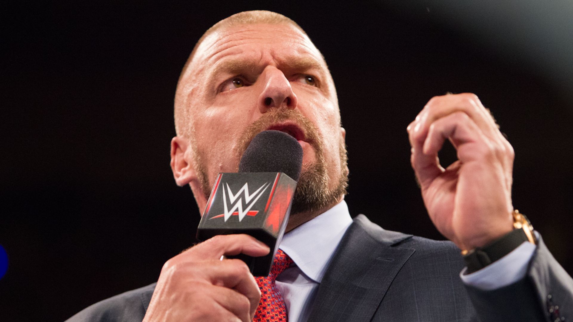 Triple H during a promo. Image Credits: wwe.com