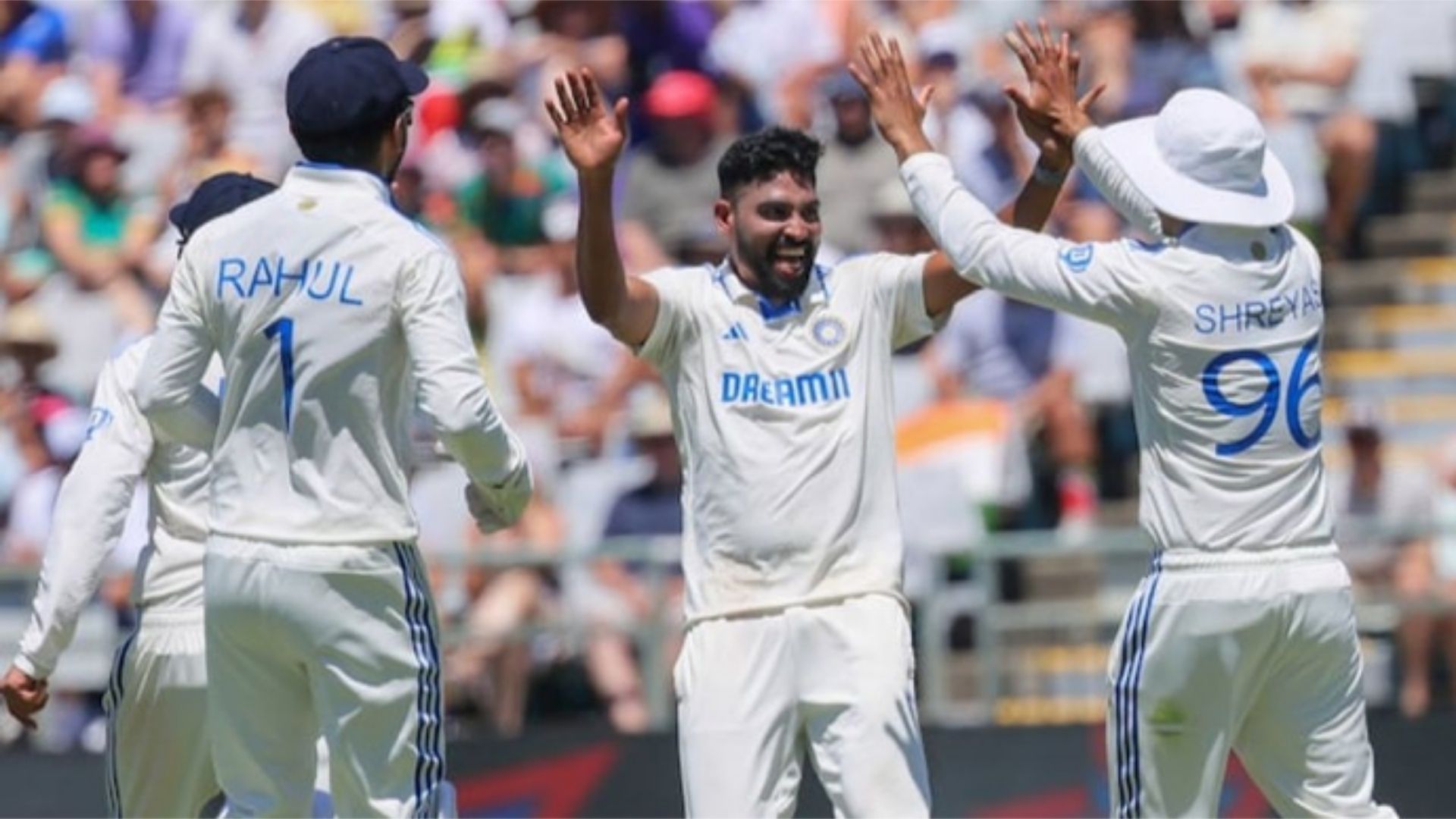 Mohammed Siraj (center)