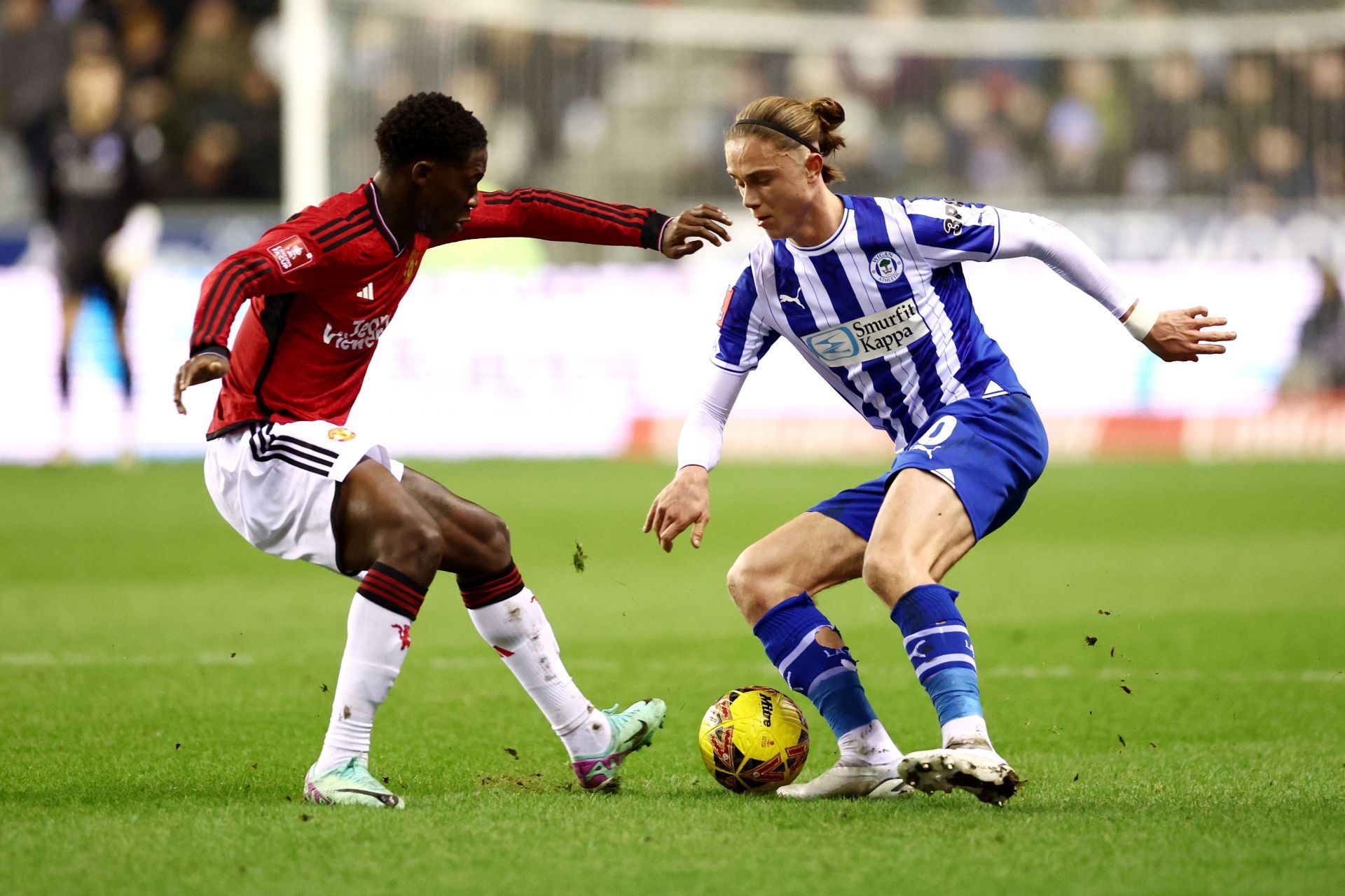 Mainoo (L) shone in midfield for United in this game.