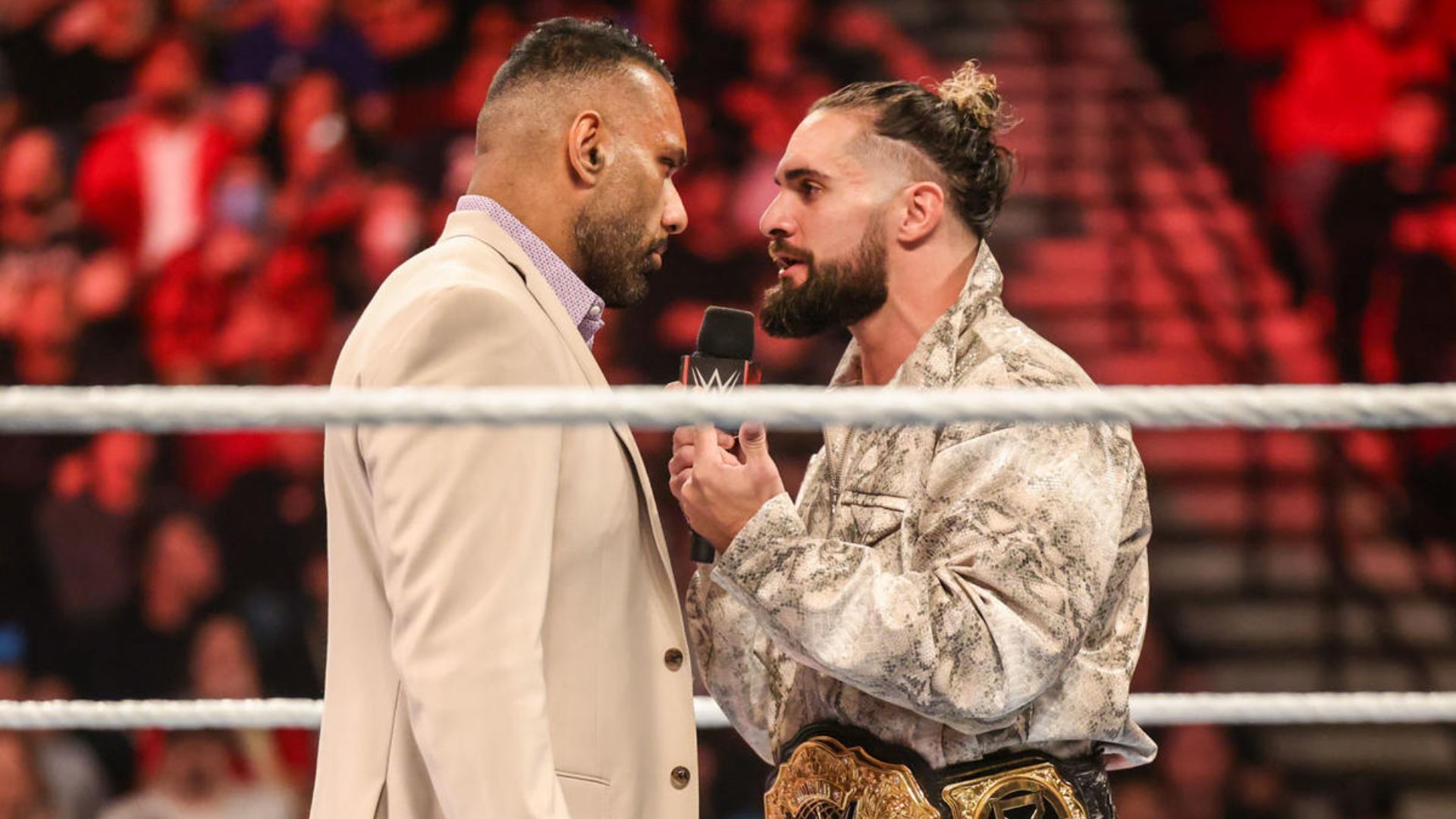 Jinder Mahal and Seth Rollins during a promo