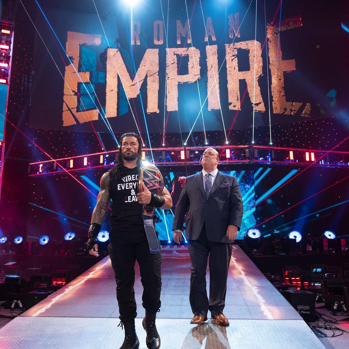 Roman Reigns with Paul Heyman.