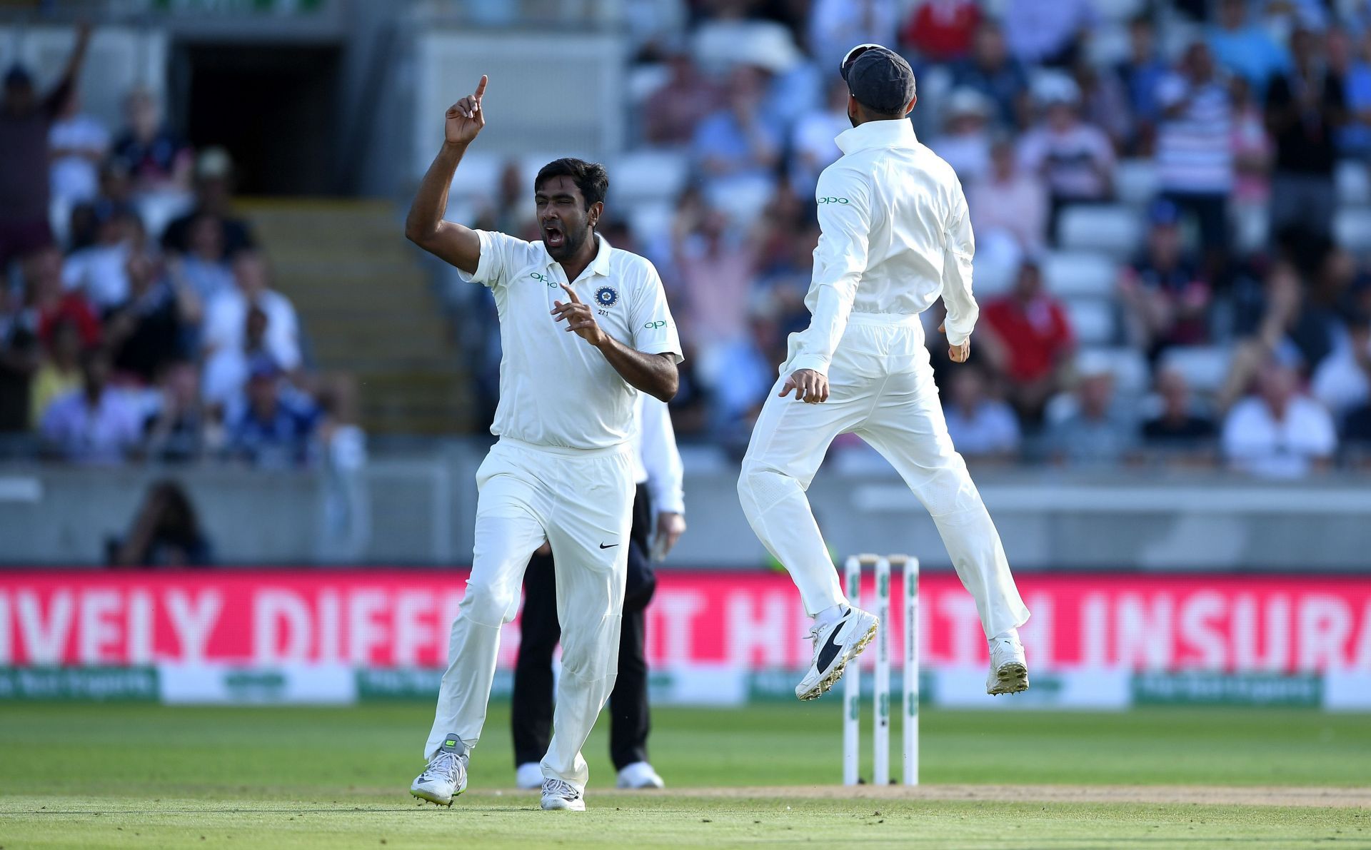 Ashwin celebrates picking a wicket against England.