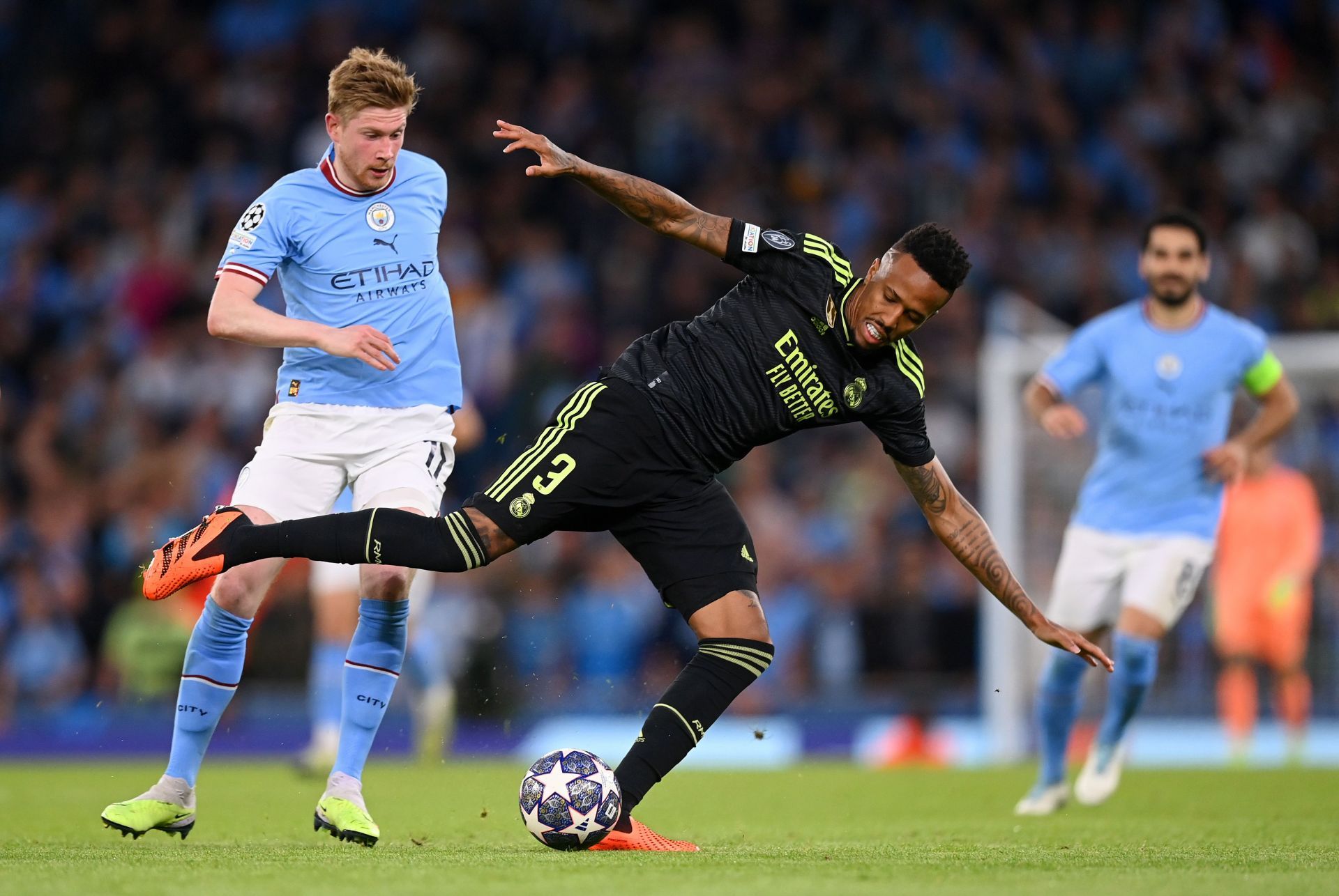 Eder Militao (centre) is set to stay at the Santiago Bernabeu.