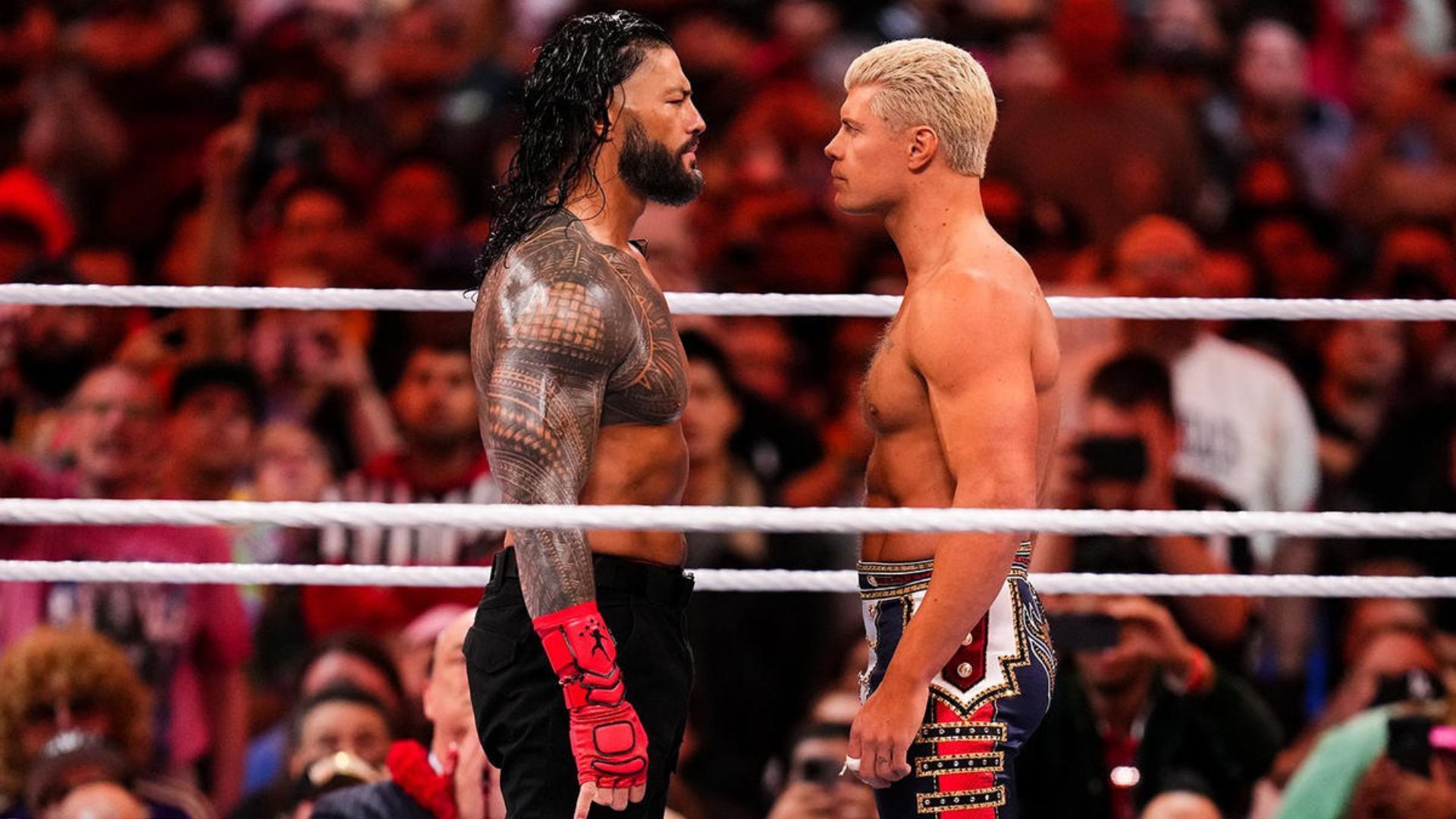 Roman Reigns and Cody Rhodes during their match at WrestleMania 39