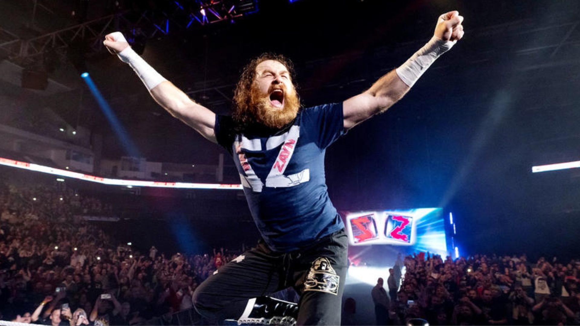 Sami Zayn during his entrance at a WWE event