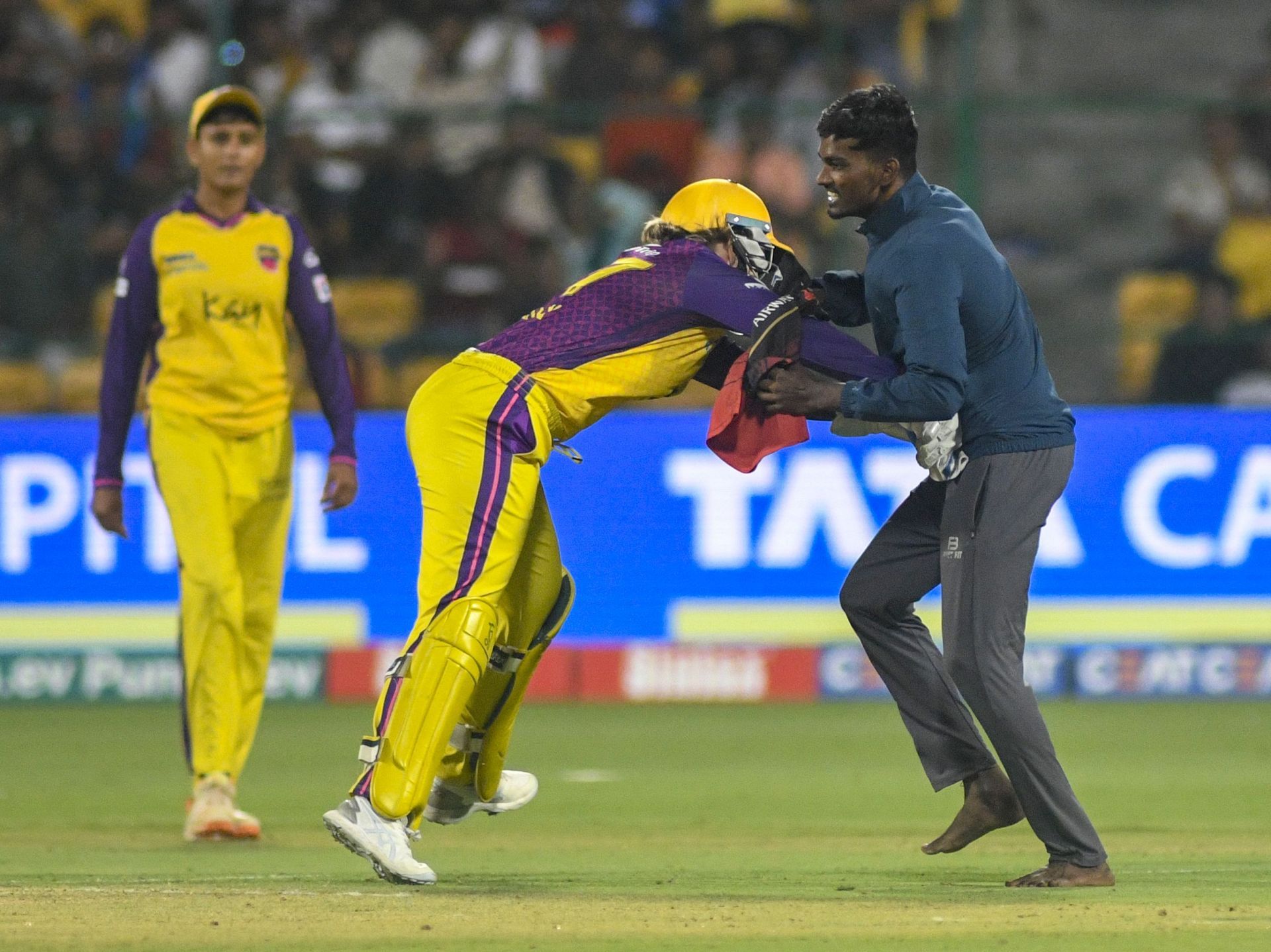 Alyssa Healy tackling an invader