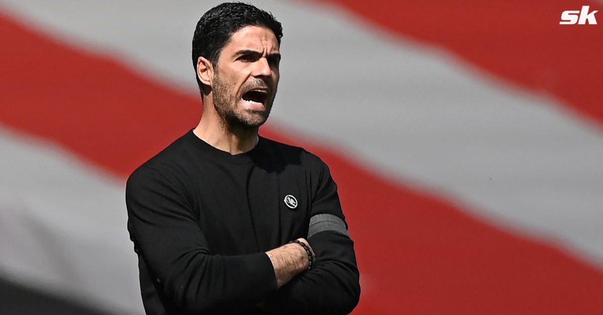 Arsenal boss Mikel Arteta looks on.