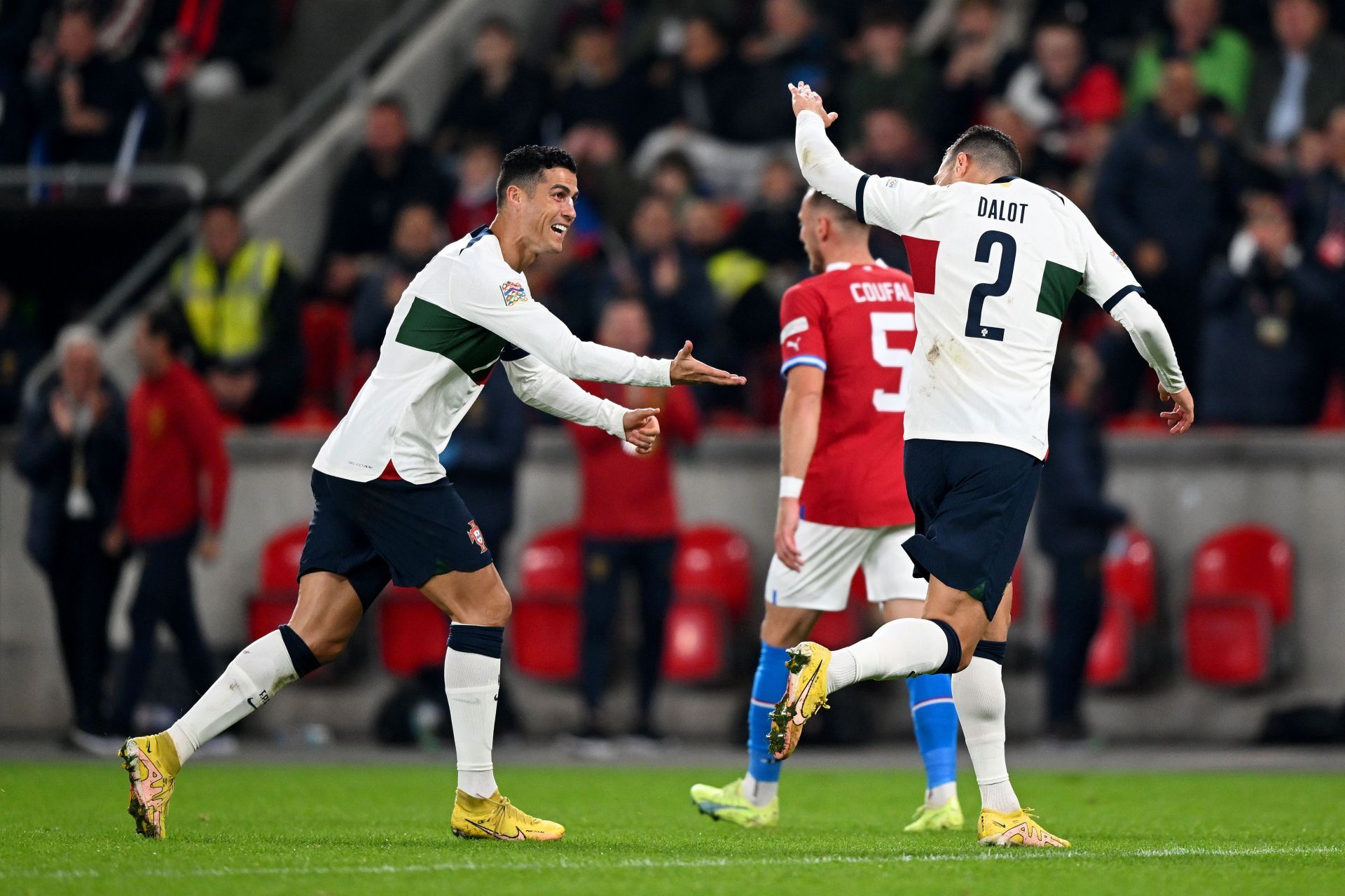 Cristiano Ronaldo (left) and Diogo Dalot