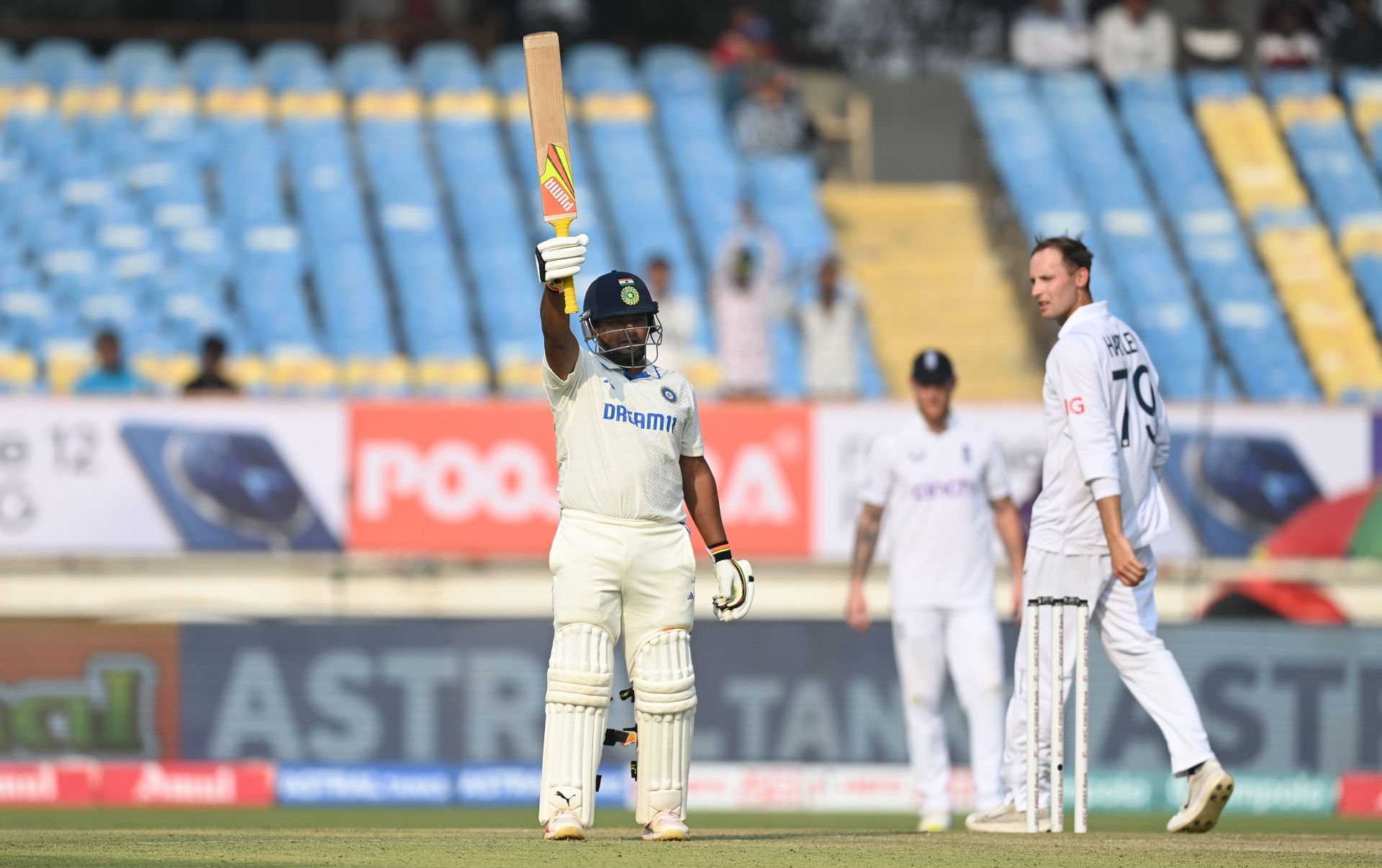Sarfaraz Khan celebrates reaching his fifty: India v England - 3rd Test Match: Day One