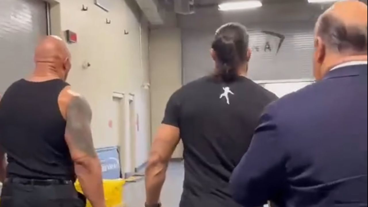 The Rock and Roman Reigns leaving together (via WWE